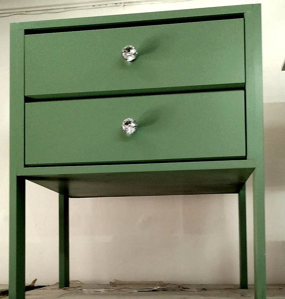Green two-drawer bedside pedestal with crystal knobs on four slim legs